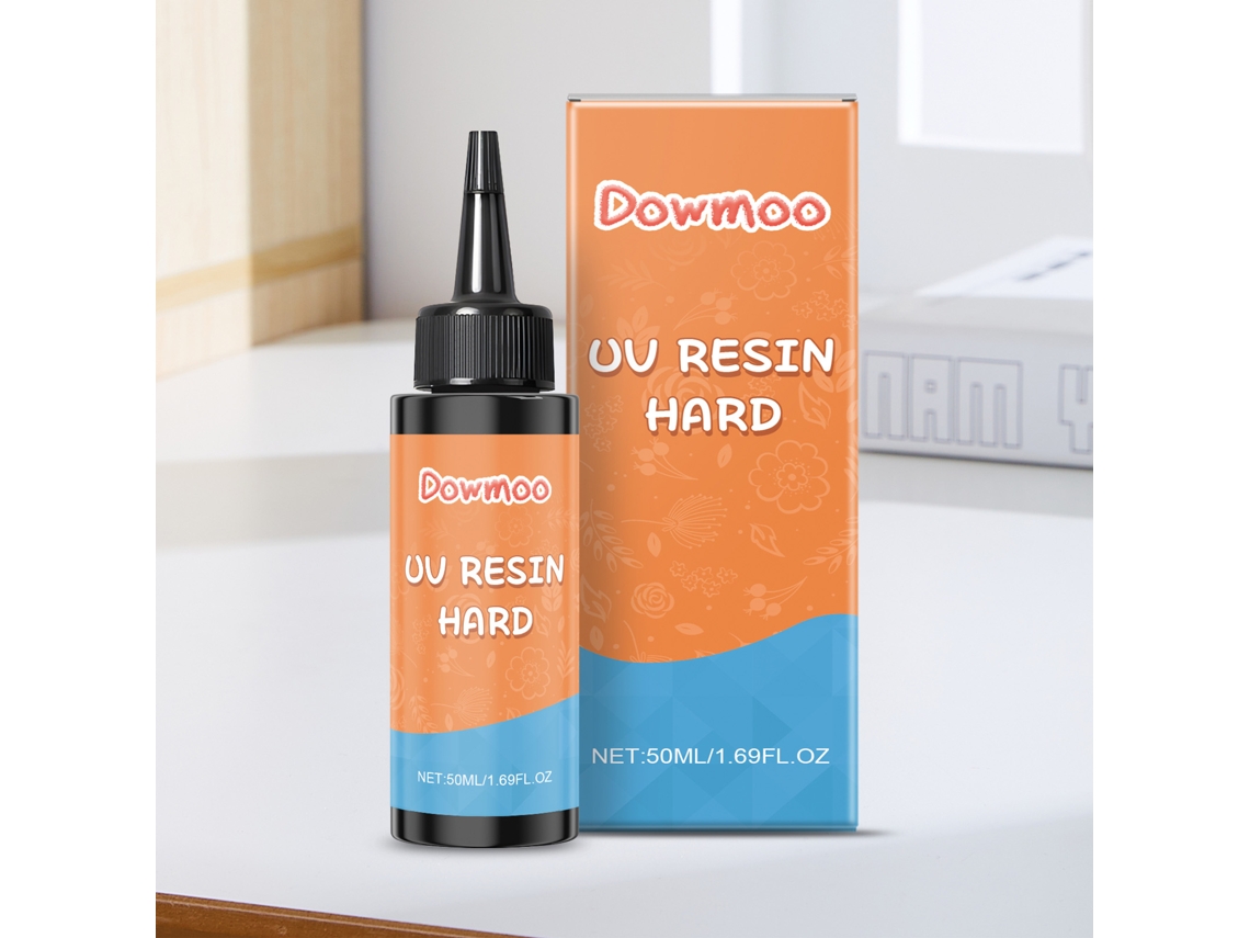 Adhesivo de resina epoxi de alta transparencia con curado UV para manualidades, curado rápido bajo luz UV.