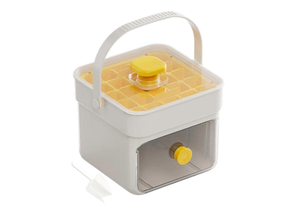 Cubitera con tapa, doble capa, sistema de presión para facilitar su extracción, ideal para bebidas como cócteles, café y té, en color amarillo.