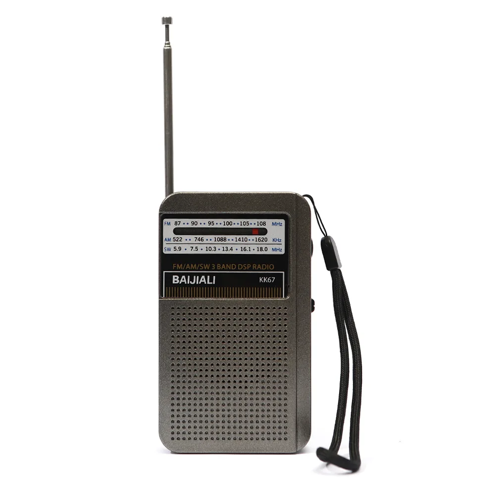 Mini radio FM/AM/onda corta (gris) con alta sensibilidad, indicador de frecuencia y batería recargable.