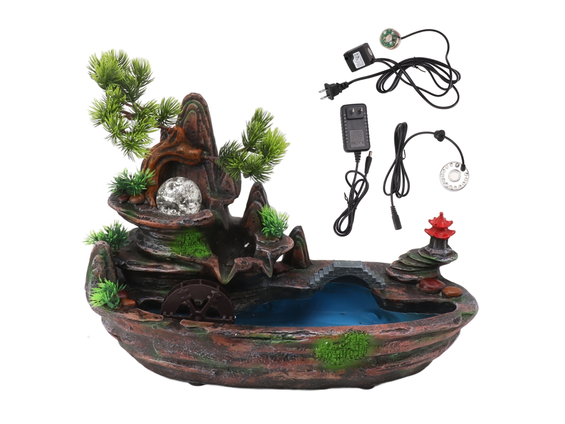 Cascada de montaña en miniatura con decoración de atomizador