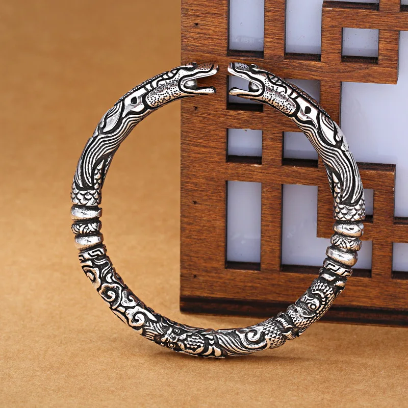 Pulsera/anillo de plata tibetana con dos dragones y correa ajustable. MDUG
