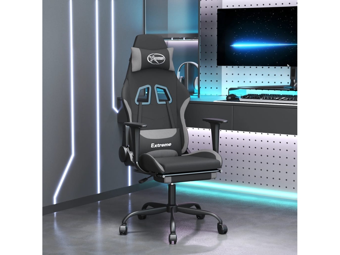Silla gaming con reposapiés, tapizada en tela gris y verde claro.