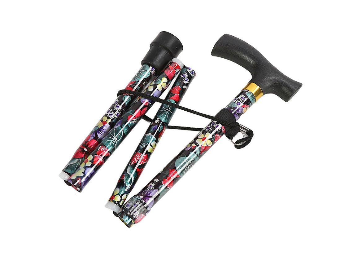 Bastón plegable con estampado floral y empuñadura en T, ideal para personas mayores que necesitan movilidad en exteriores.