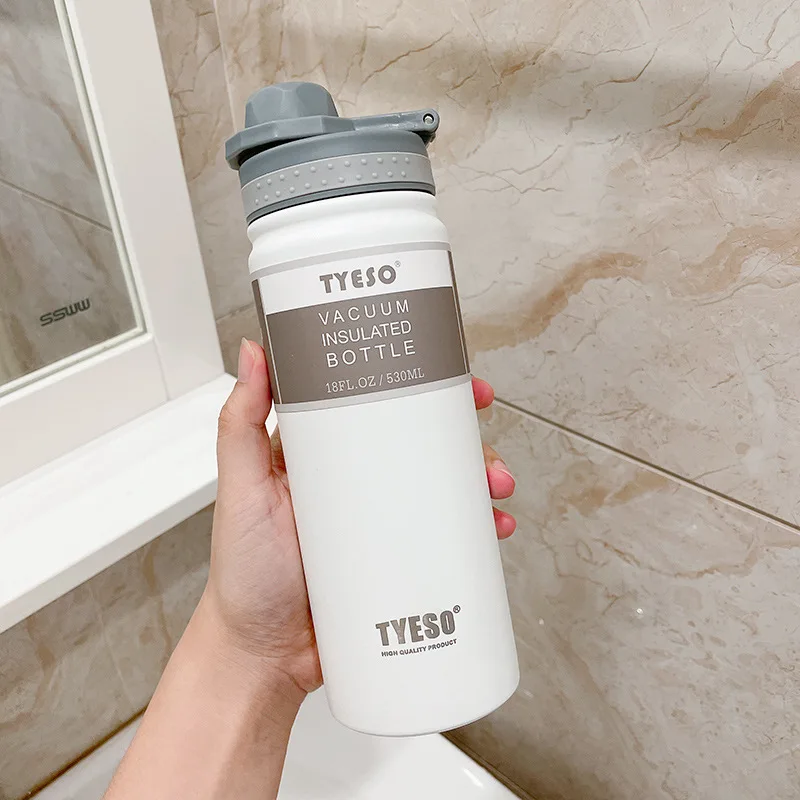 Taza térmica de viaje de acero inoxidable (blanca, 750 ml) con aislamiento al vacío, ideal para agua fría y caliente.