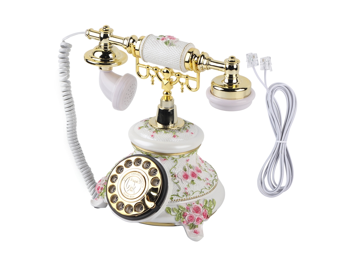 Teléfono fijo antiguo con diales giratorios y diseño retro