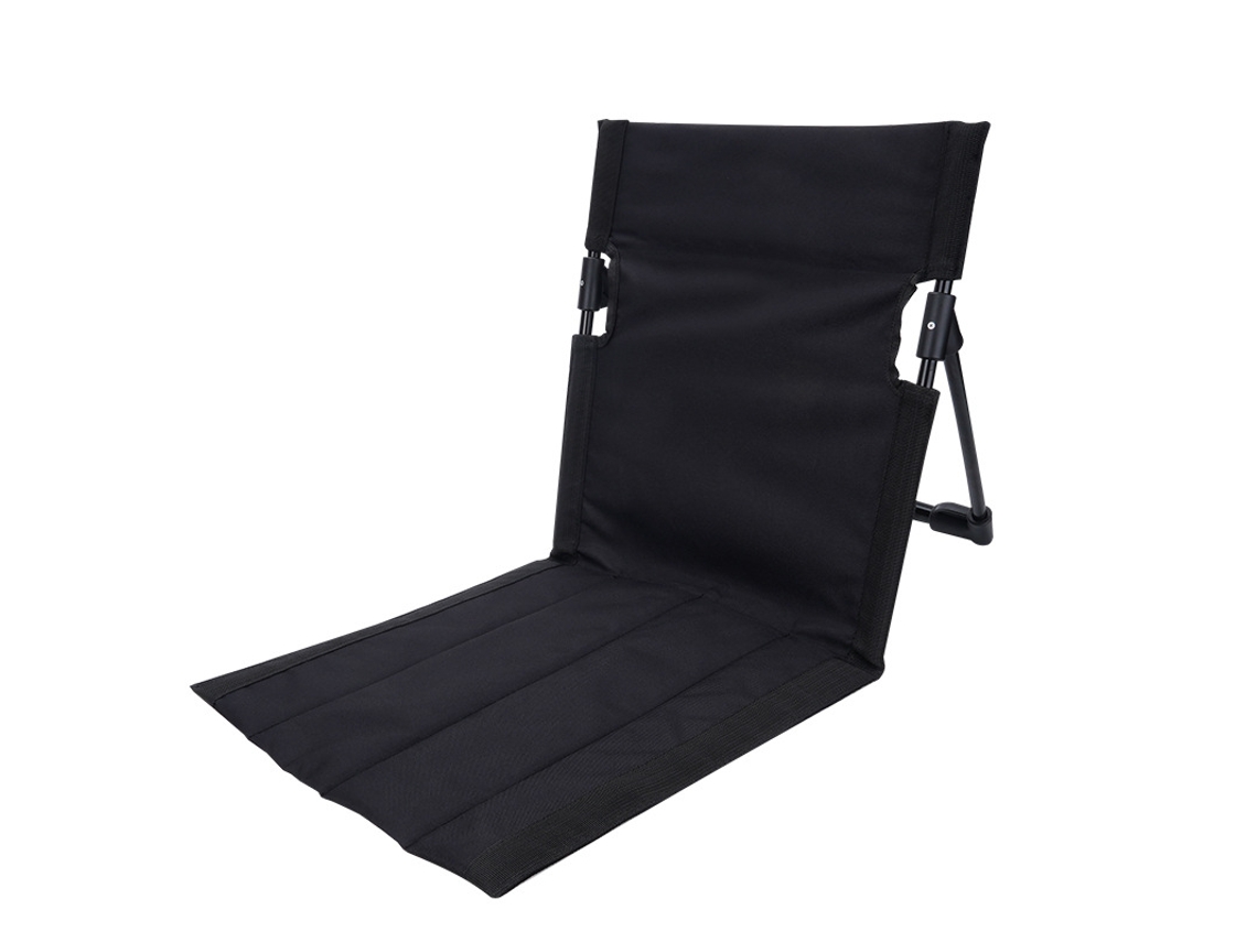 Silla de camping plegable ultraligera (negra), ideal para actividades al aire libre, con bolsa de almacenamiento.