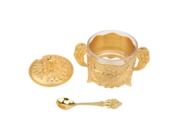 Azucarero de cristal de estilo europeo con tapa y cuchara.