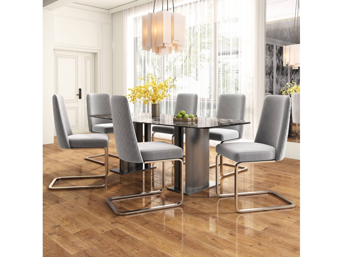 Juego de 6 sillas Cantilever de terciopelo, respaldo con diseño de rombos y base de metal gris plateado.