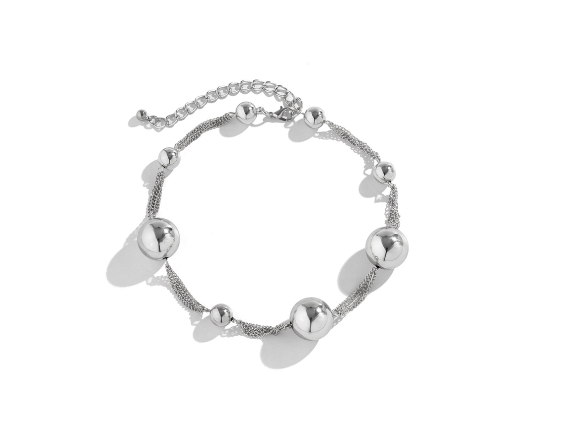 Kit desechable estéril para perforación nasal con collar de perlas de imitación para mujer.