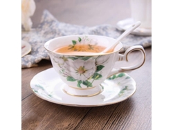 Juego de taza y platillo de cerámica con flores, 210 ml, sin marca.