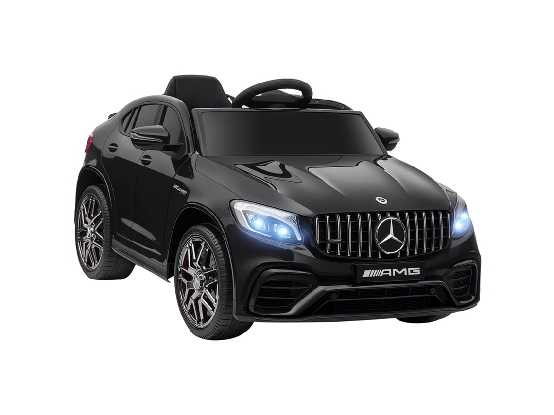 Coche eléctrico Mercedes AMG de 12 V para niños a partir de 3 años con mando a distancia, música, luces y puerta que se abre. Medidas: 115 x 70 x 55 cm. Color: negro.