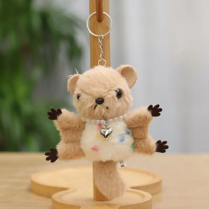 Llavero de murciélago de peluche adorable con collar de perlas, suave y tierno, un encantador adorno para bolso. MDUG (marrón)