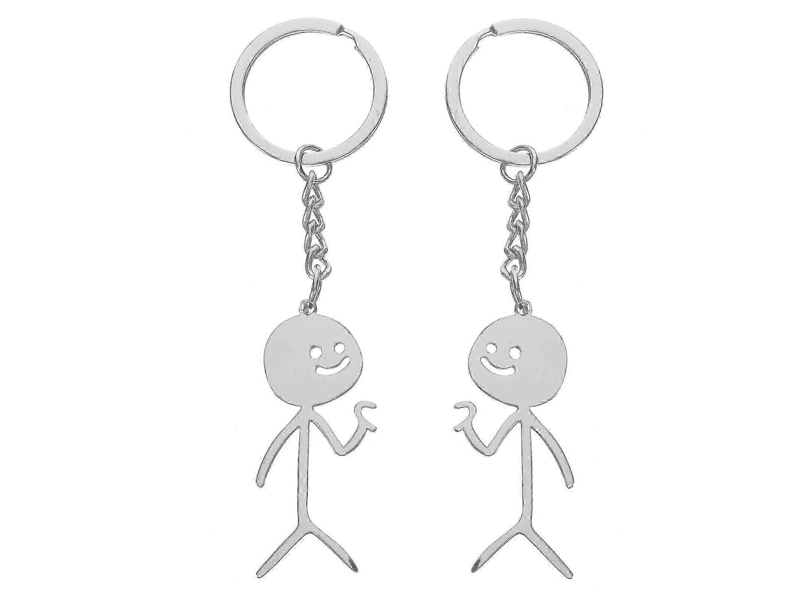 2 llaveros divertidos de acero inoxidable con diseño de monigote.