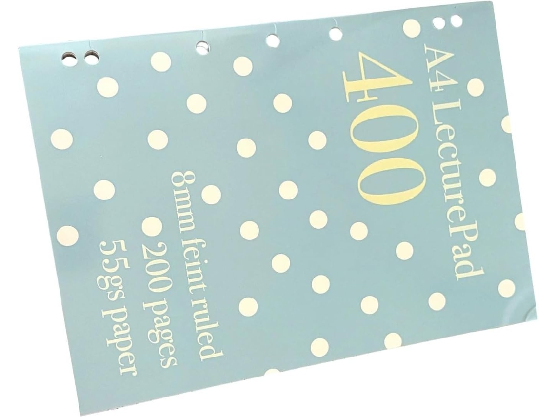 Cuaderno De Alta Calidad Con Un Llamativo Estampado De Lunares Y Páginas Rayadas.