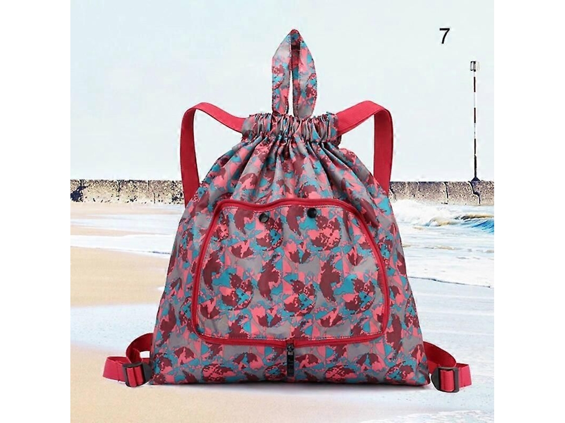 Mochila multifuncional, plegable y portátil con estampado floral para mujer, ideal para acampar y actividades al aire libre. Gran capacidad y diseño atractivo.
