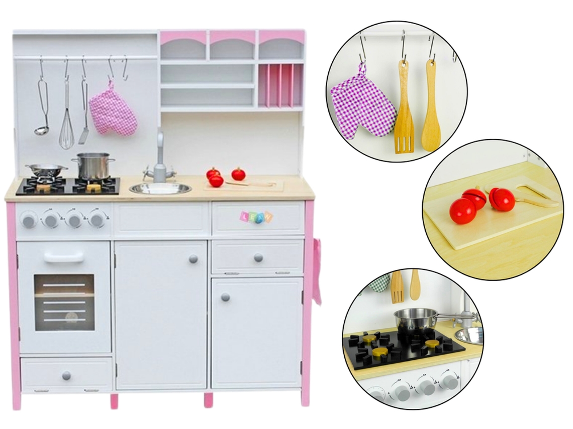 Cocina infantil de madera Paula rosa y blanca con elementos de apertura B.active