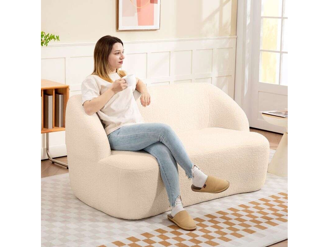 Sofá de dos plazas en tejido bouclette, 142 cm, respaldo y asiento curvos, sin montar, color beige.