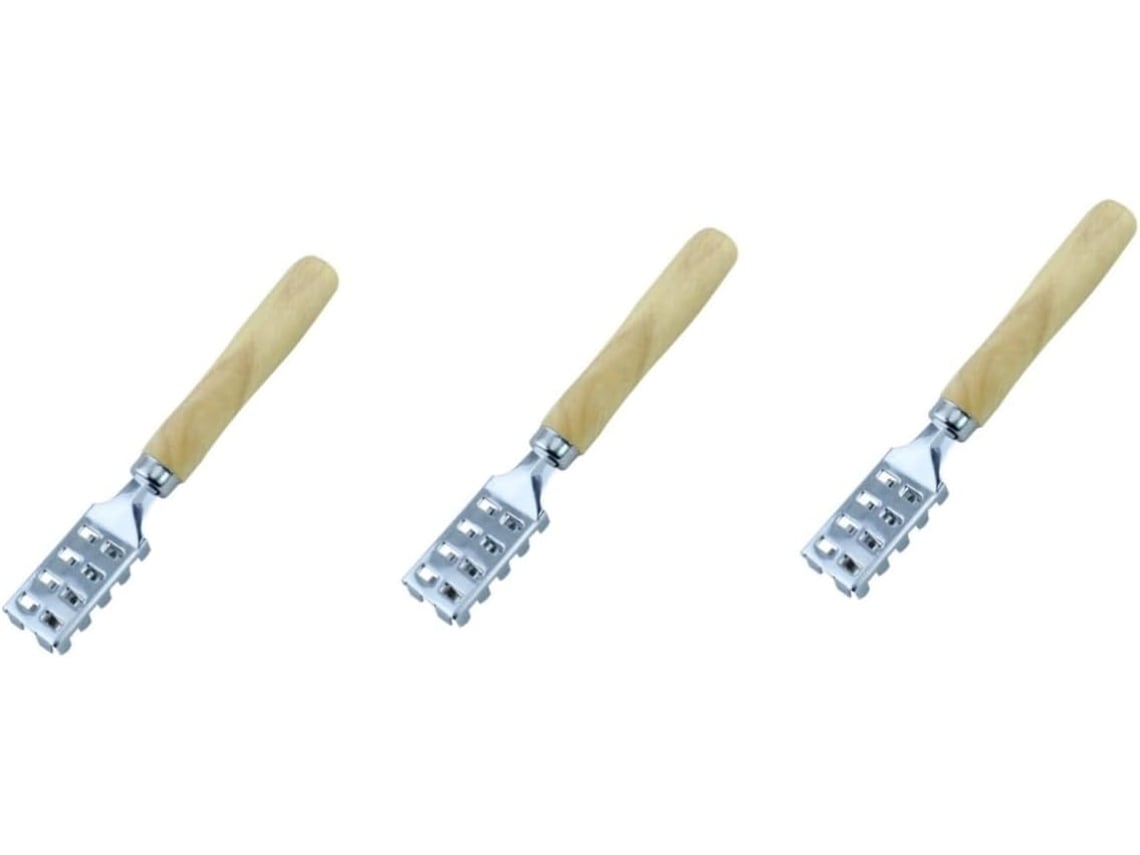 Raspador De Peixe: Design Simples E Prático.brpara Remover A Pele Do Peixe: As Escamas São Retiradas Pelos