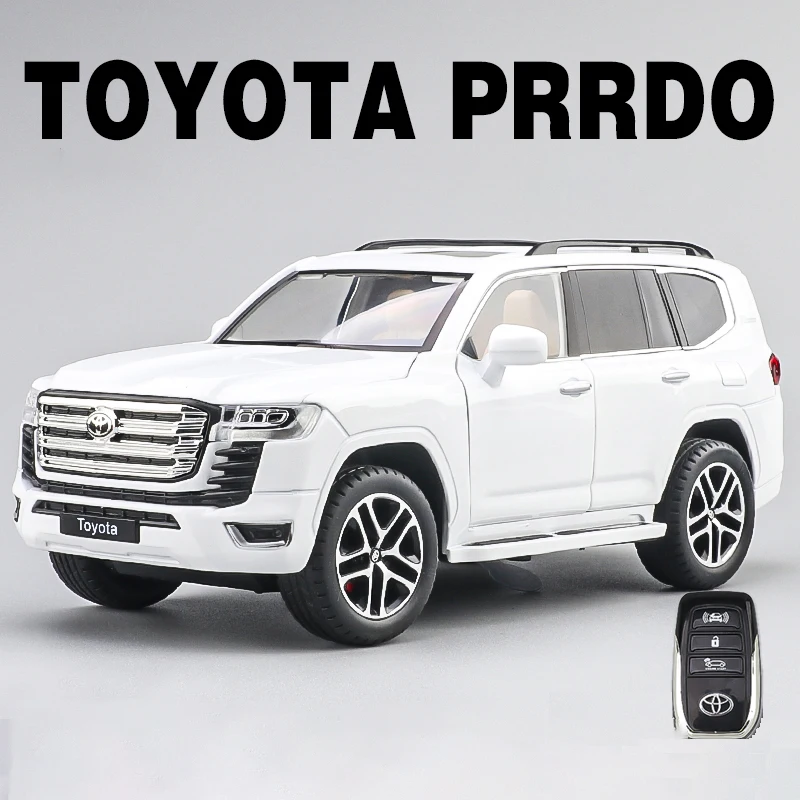 (Blanco) Toyota Land Cruiser Prado a escala 1:24, coche miniatura con control remoto, sonido y luz.