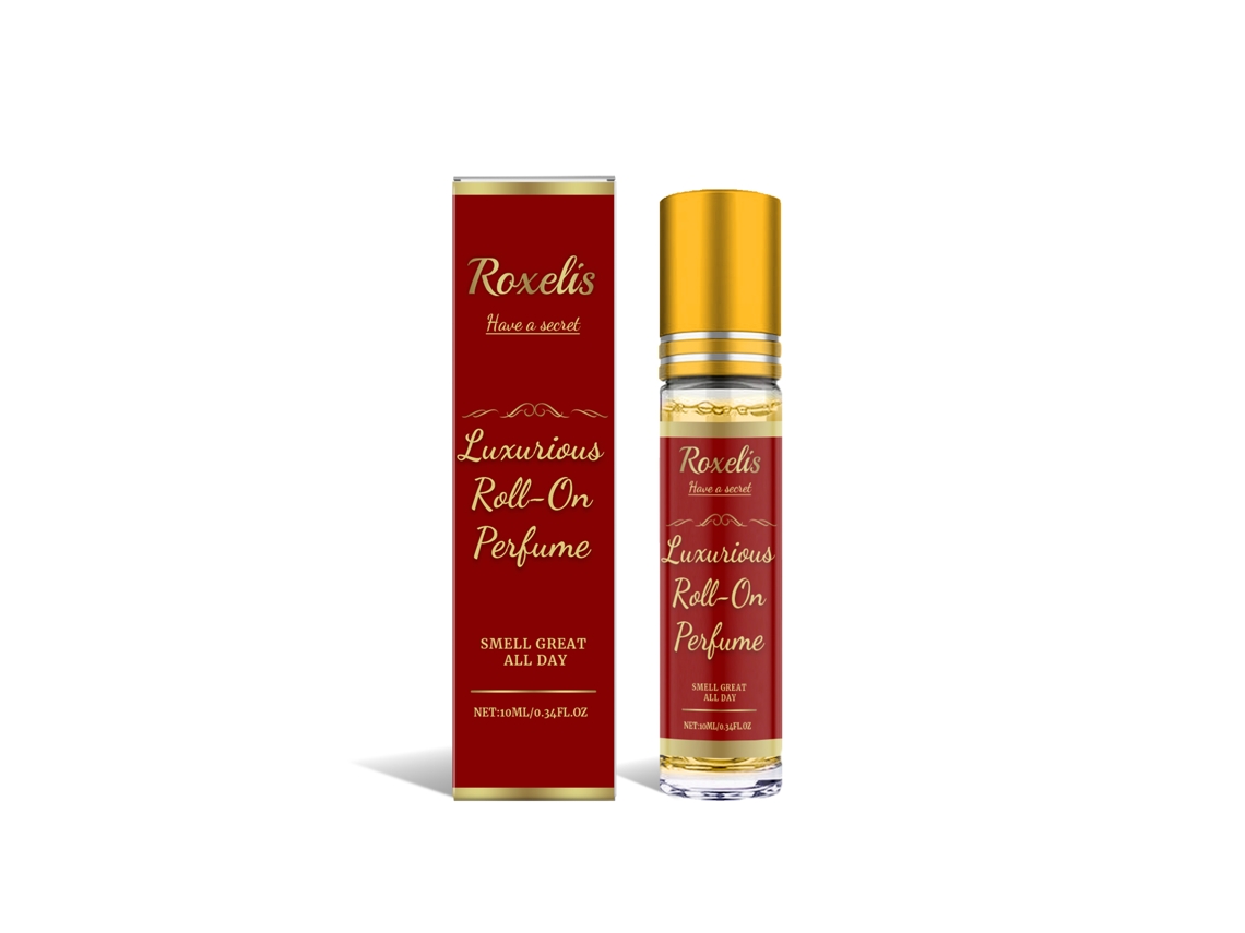 Perfume de lujo con aplicador roll-on.