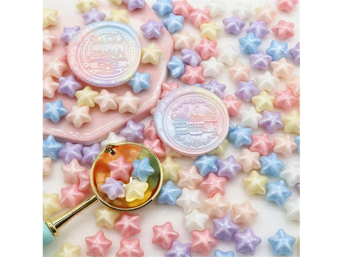 Frijoles de cera de colores mezclados sellados con estrellas para invitaciones y sobres de boda