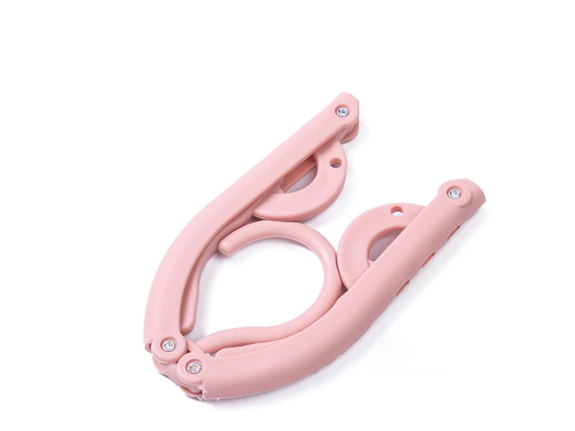 Tendedero plegable multifuncional de plástico, color rosa.