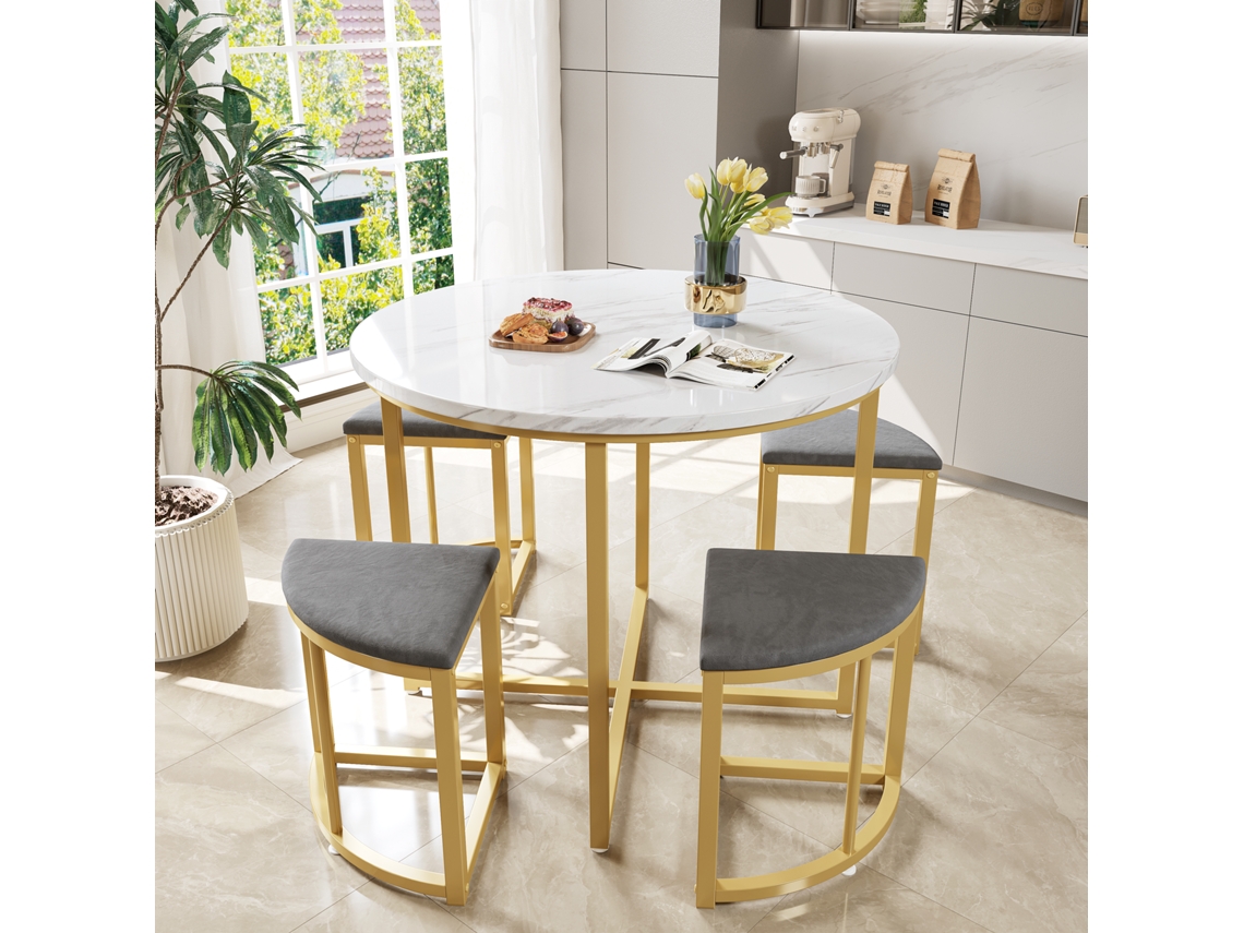 Mesa con 4 sillas, terciopelo gris, patas doradas, estilo moderno.