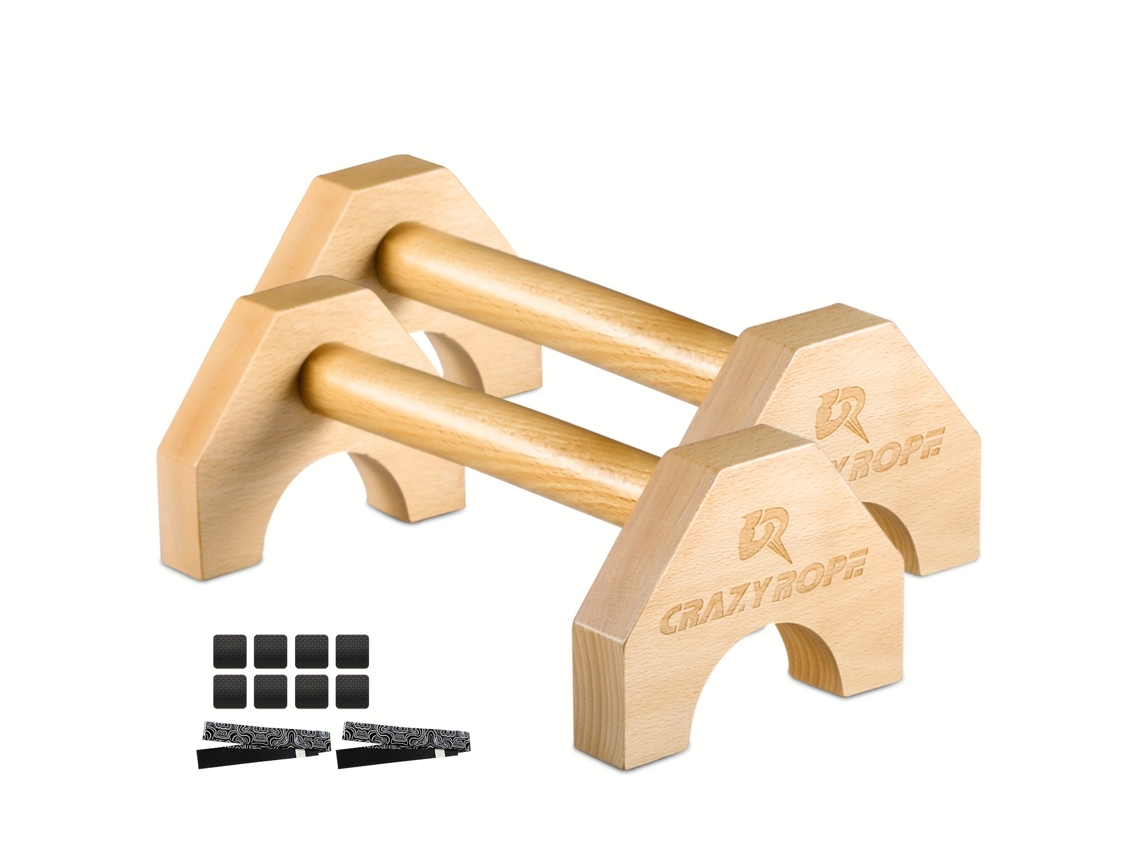 Un par de barras de madera para flexiones, aptas para su uso en gimnasios.