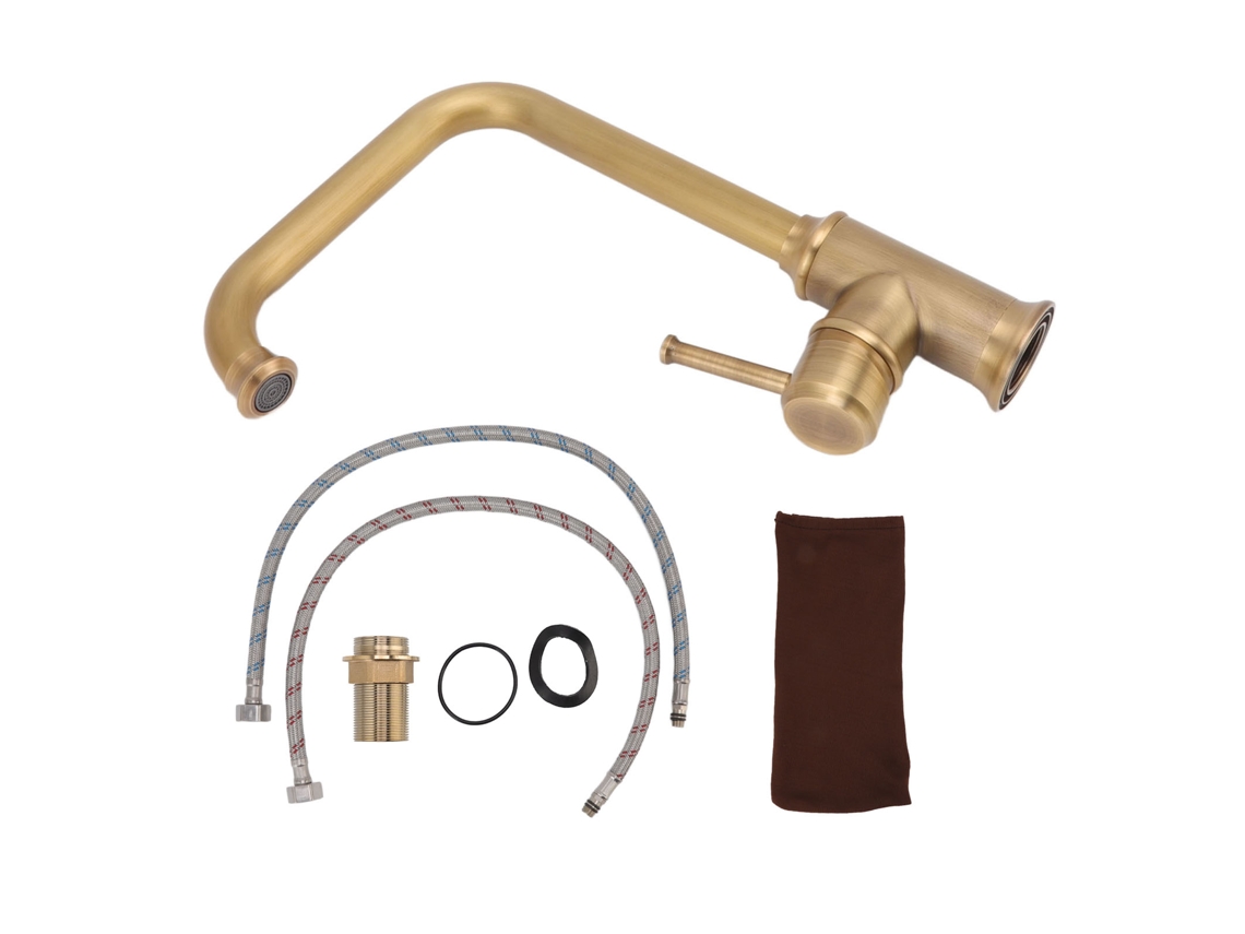 Inodoro antiguo con grifo de agua fría/caliente