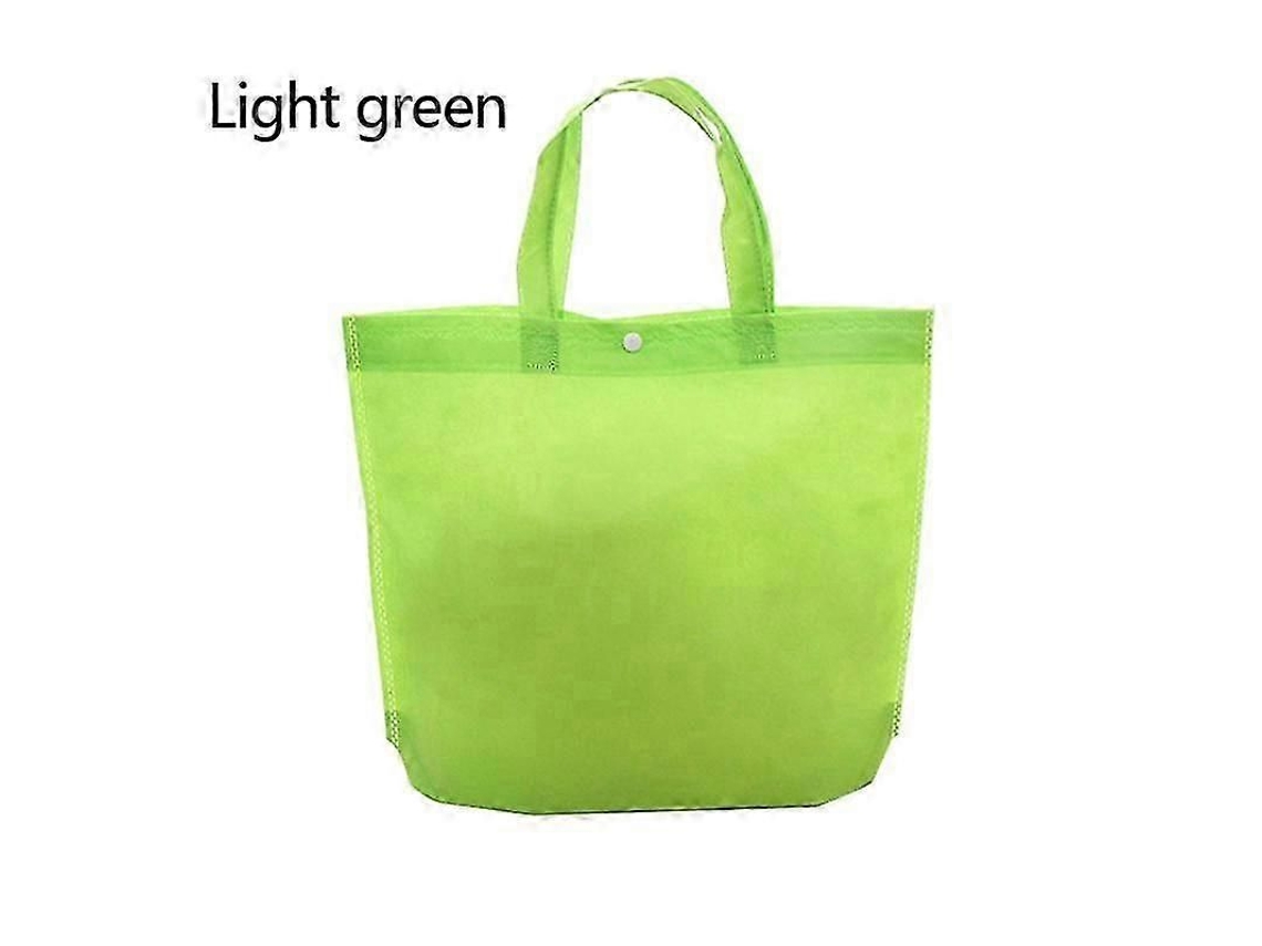 Bolsa de la compra reutilizable y plegable con botón, fabricada en tejido no tejido resistente, ideal para guardar tus pertenencias. Reciclable y ecológica.
