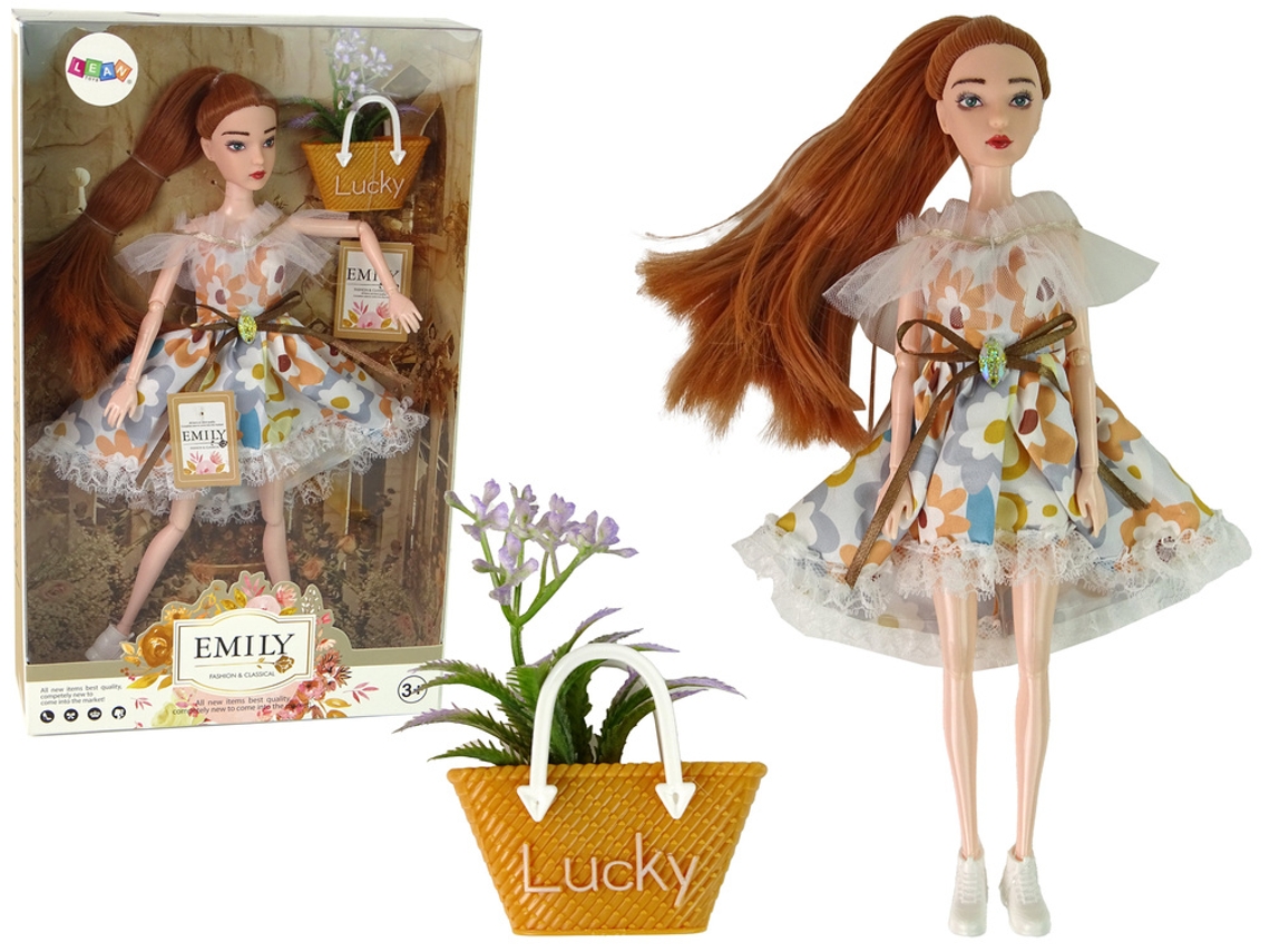 Muñeca bebé Emily Autumn con cabello rojo y flores B.active