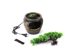 Árbol artificial que simula una pequeña roca decorativa para el escritorio de la oficina en casa.