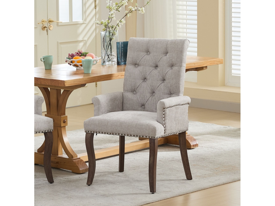 Silla De Comedor Tapizada En Chenilla Beige Con Patas De Madera Curvadas.