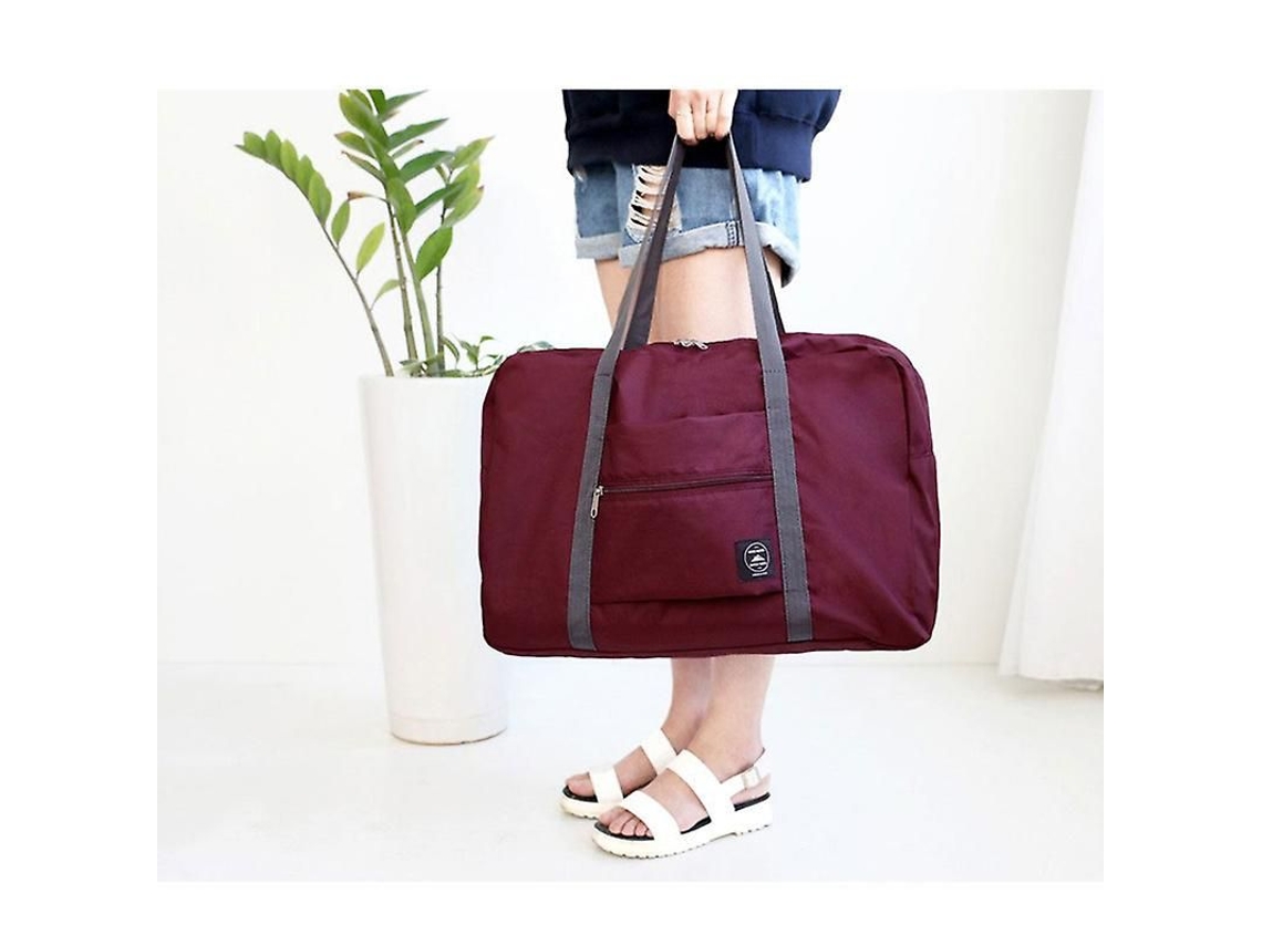 Bolsa de viaje plegable, impermeable y compacta, ideal para guardar tus pertenencias. GOKOCO
