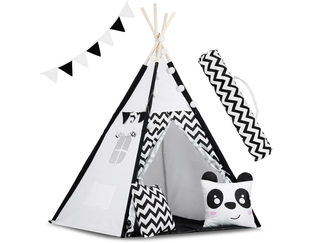 Tienda de juegos con forma de panda en blanco y negro, cojines y luces de B.active