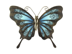 Adorno De Pared De Mariposa De Metal Para Jardín O Pared Exterior Sobre Cristal Azul.