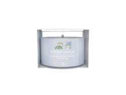 Vela votiva de vidrio única de Yankee Candle en un lugar tranquilo y apacible