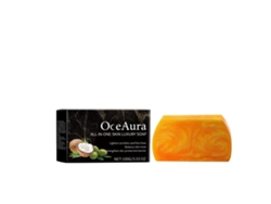 Jabón dorado con aceite esencial para el cuidado facial y corporal.