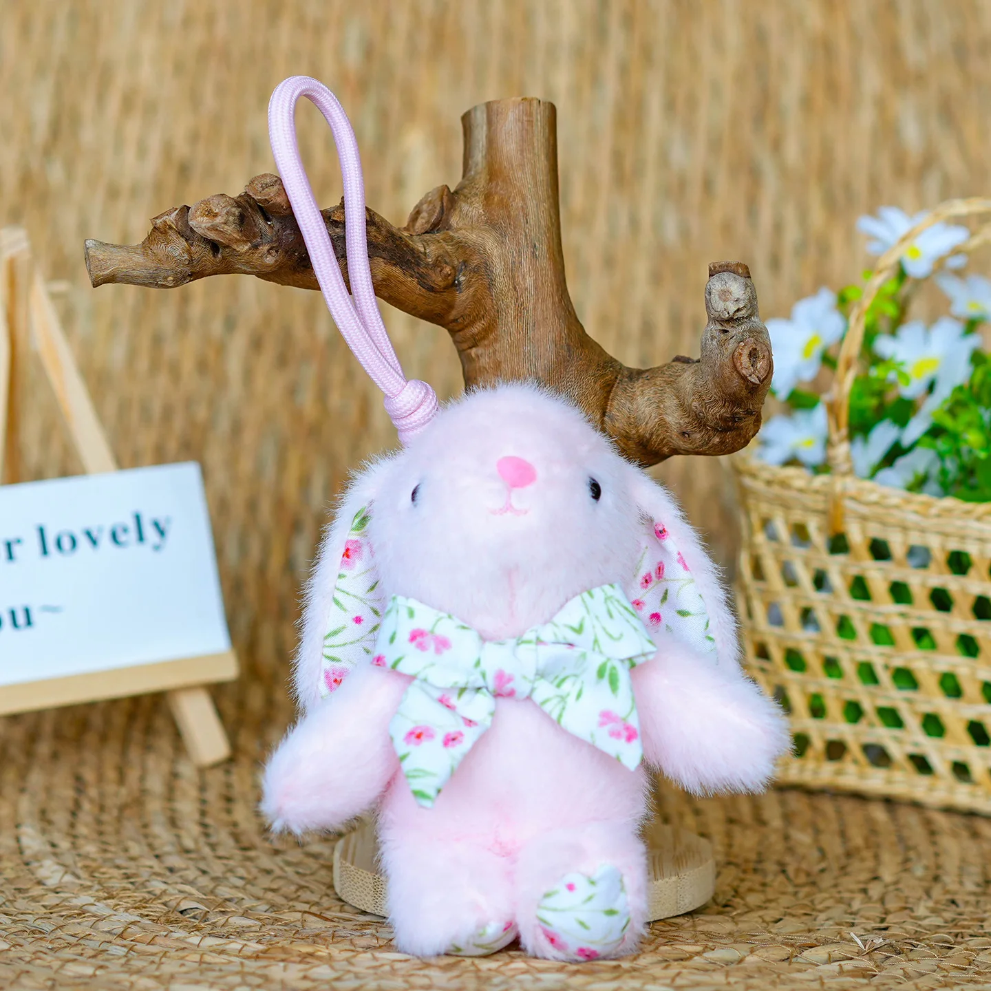 Llavero de conejito de peluche con lazo de flor rosa, 12 cm, para bolso o accesorio.