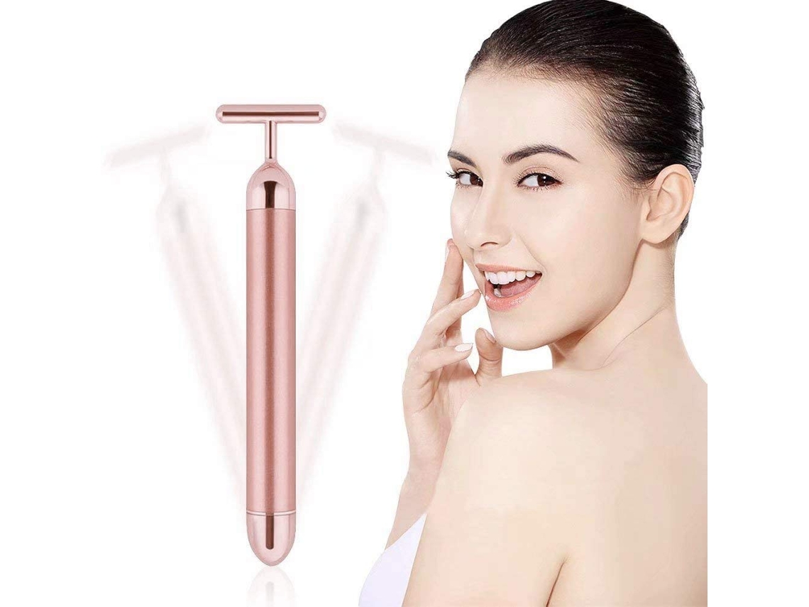Masajeador facial eléctrico pulsante en forma de T para piel sensible. Levanta y reafirma la piel del rostro.