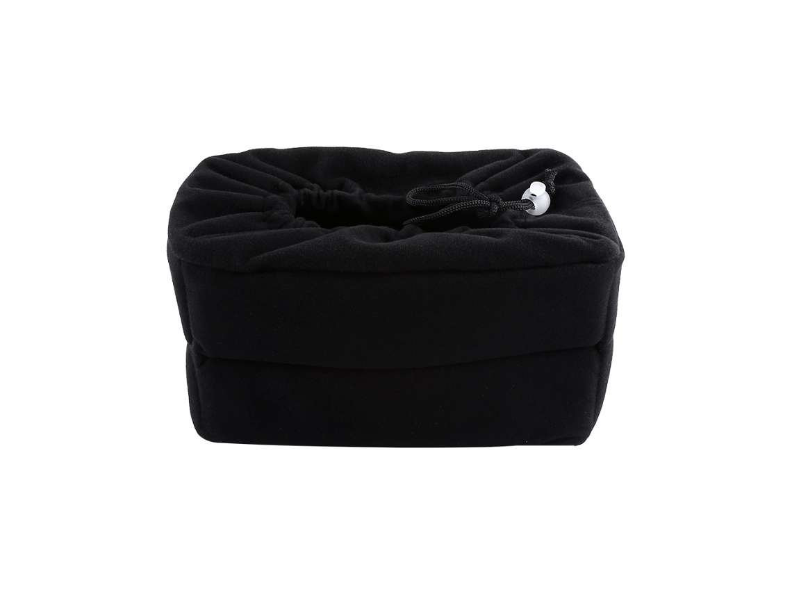 Mochila para cámara réflex digital con compartimentos acolchados, insertables y protectores.