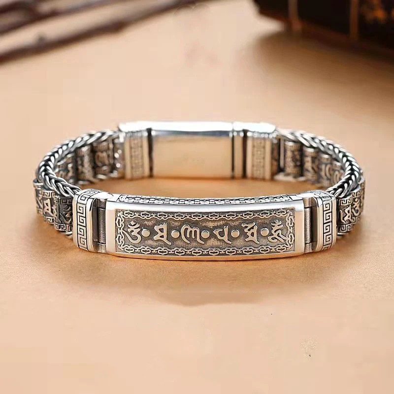 Pulsera budista tibetana con rueda de oración y cuentas giratorias que forman la palabra "om". MDUG (20 cm)