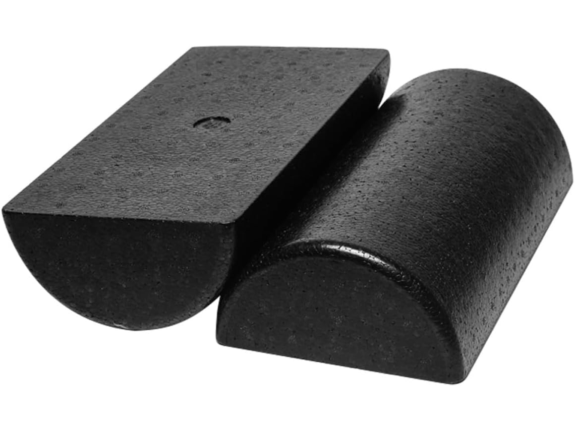 Rodillo de yoga negro de EPP (polipropileno expandido) para masaje muscular.