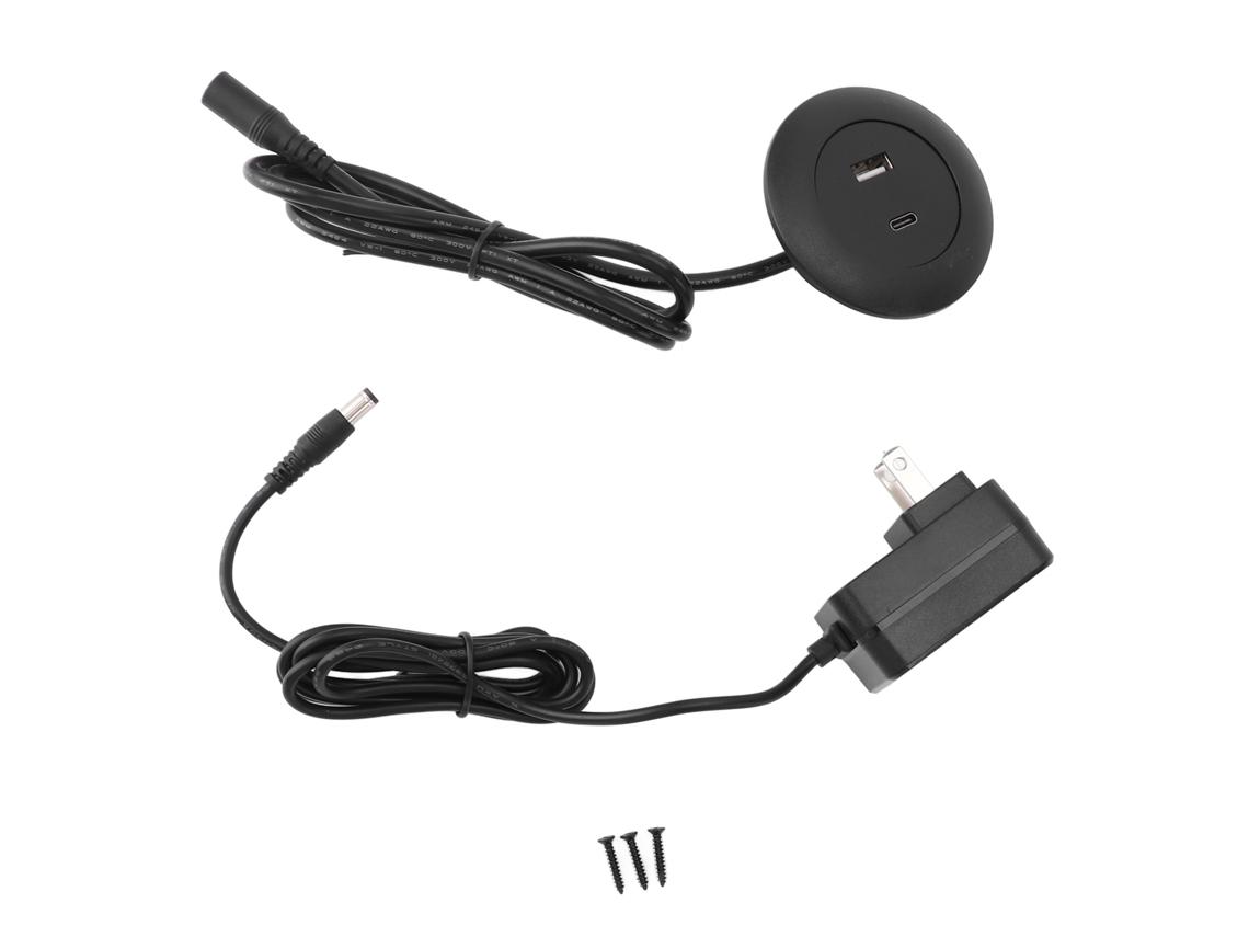 Toma de corriente integrada para sofá cama/mesa con puertos USB.