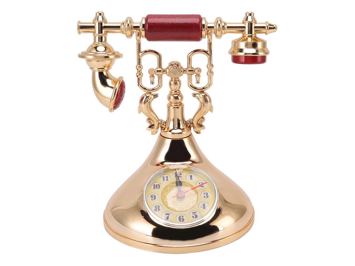Teléfono despertador vintage que muestra la hora con precisión y decora las habitaciones.