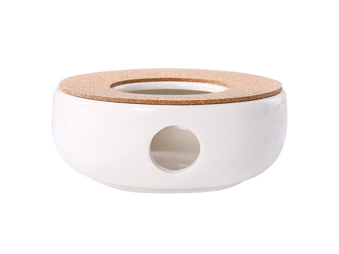 Elegante calentador de tetera de cerámica que mantiene la temperatura del té constante y ocupa poco espacio en la mesa.