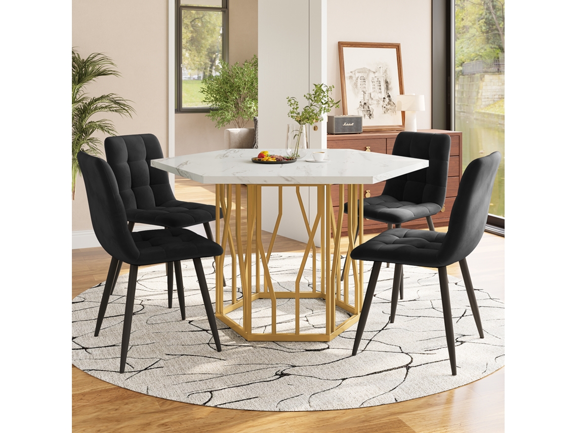Mesa hexagonal de mármol con 4 sillas de terciopelo negro y dorado.