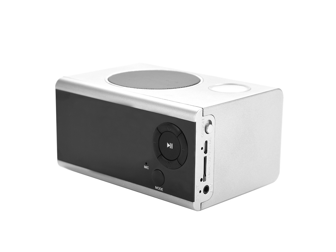 Despertador portátil con altavoz Bluetooth, radio FM y modo de repetición.