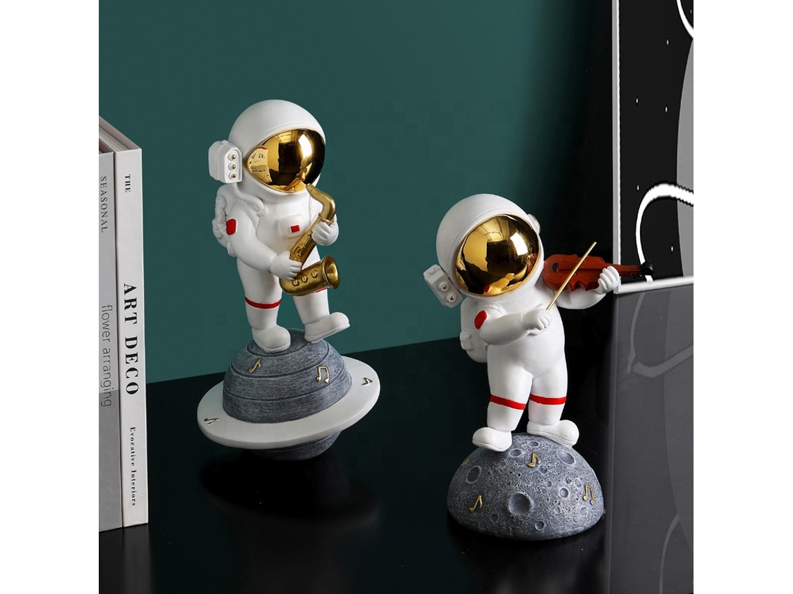 Pequeño mueble decorativo de resina para salón con temática de astronauta