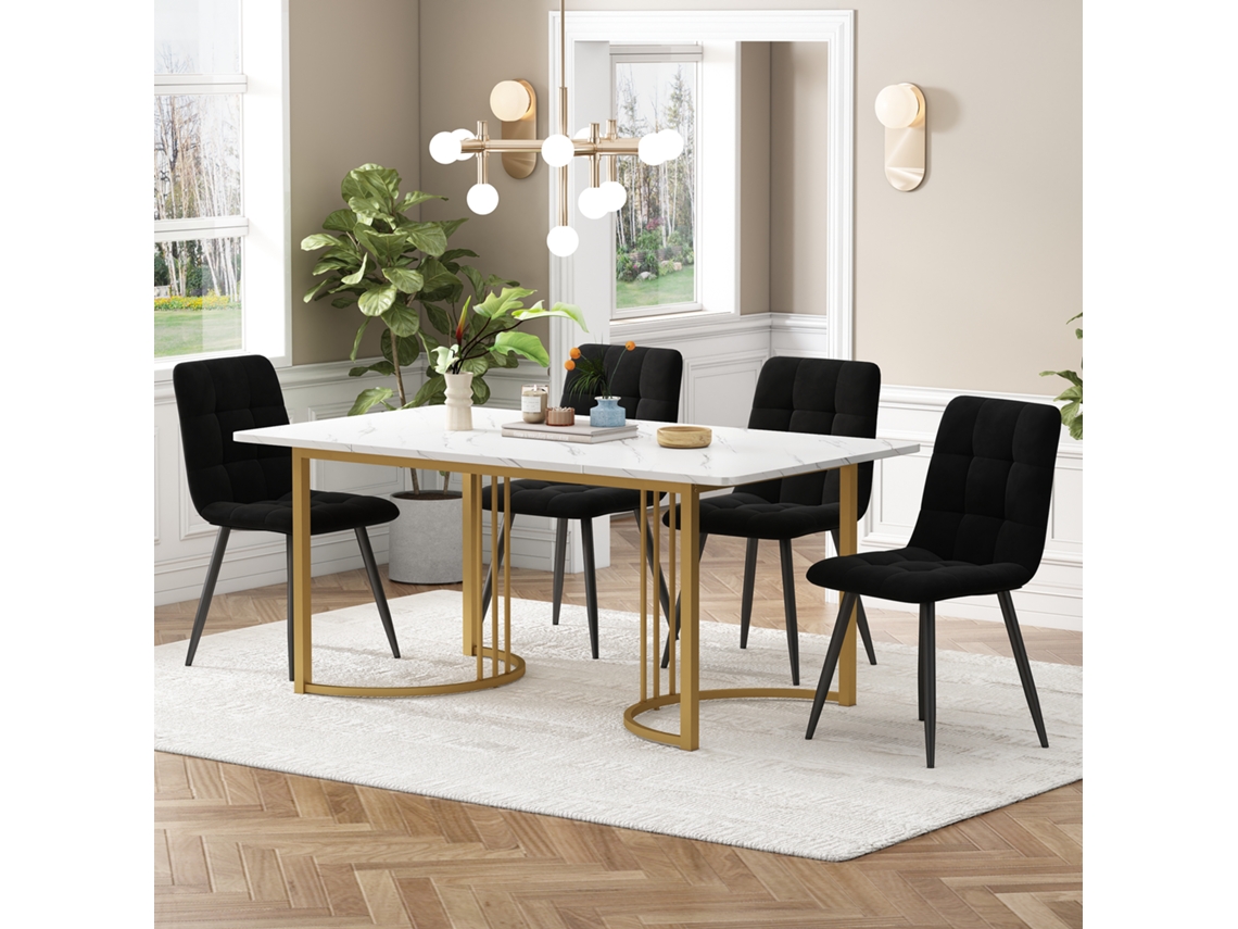 Mesa de 140 cm, 4 sillas, terciopelo negro, patas doradas.